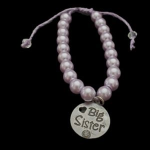Handmade adjustable hemp bracelet with faux pearl beads and big sister charm